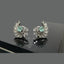 Elegant Crystal Leaf Stud Earrings with Colored Stone Center - Rs 1150