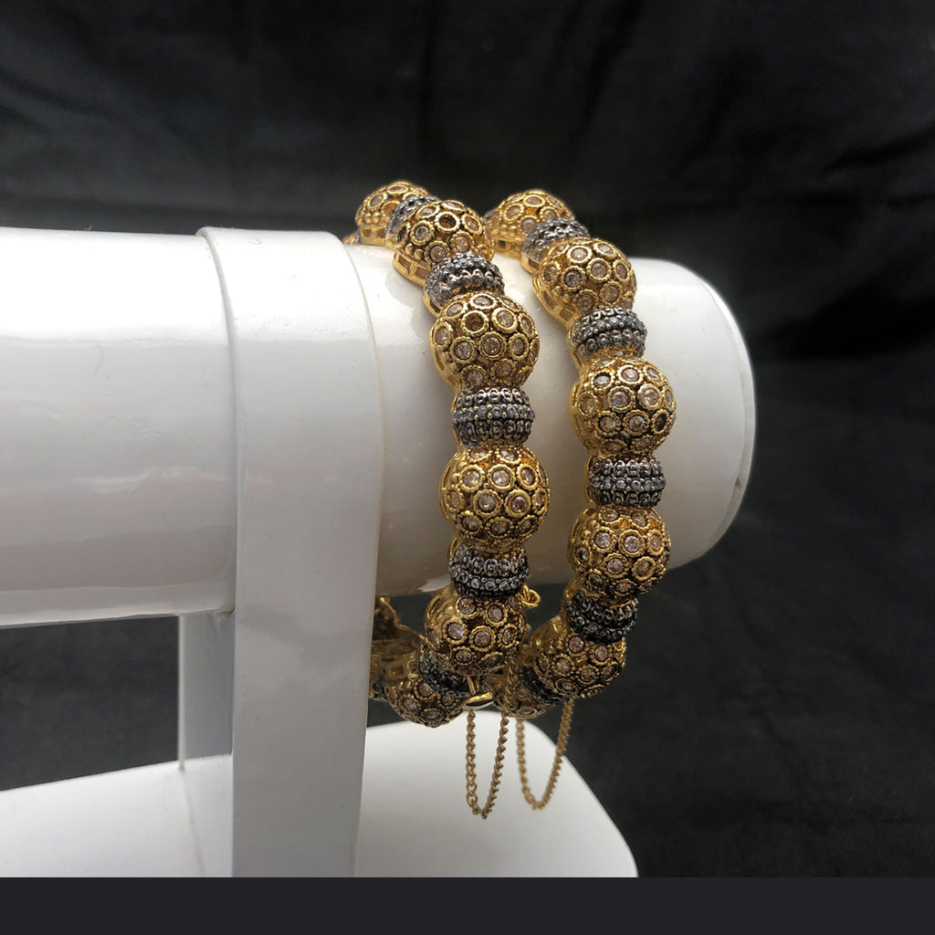 Exquisite Golden Sphere Traditional Bangles with American Diamonds