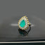 Emerald Teardrop Halo Ring in Gold Plating