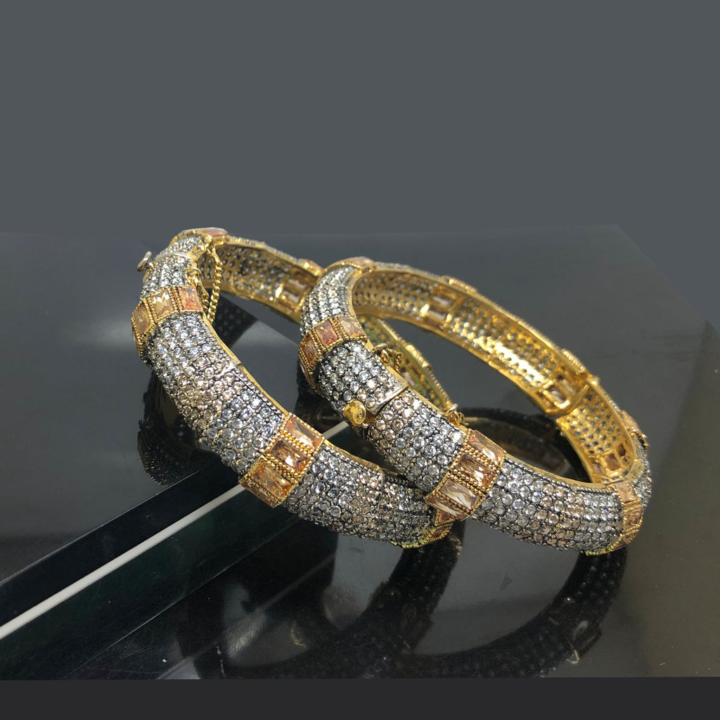 Exquisite Traditional Gold-Plated Bangles with Intricate Detailing