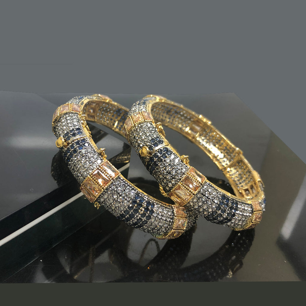 Exquisite Traditional Gold-Plated Bangles with Intricate Detailing