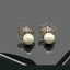 Gold-Plated Traditional Earrings with Pearl Embellishments