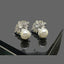 Luxury Pearl and Crystal Floral Stud Earrings - Rs 2050