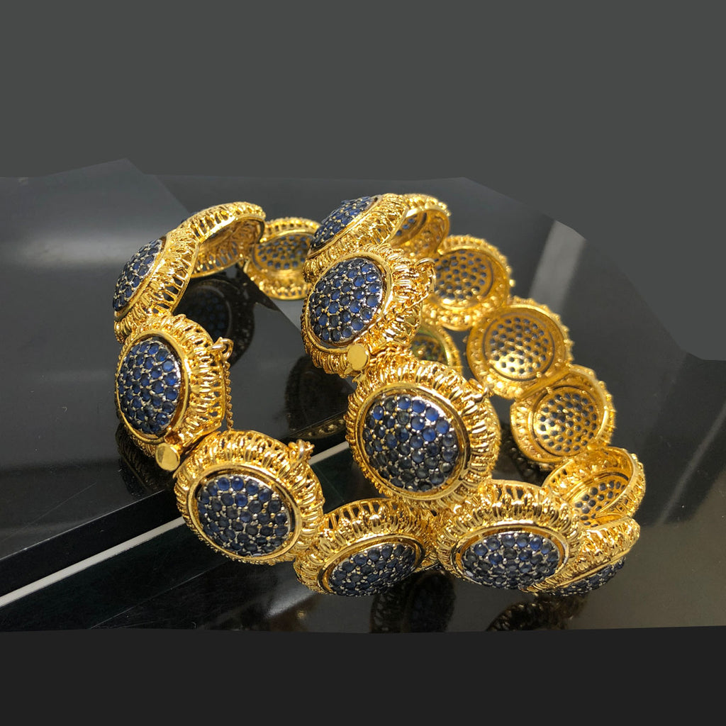 Blue Stone Encrusted Gold Bangles